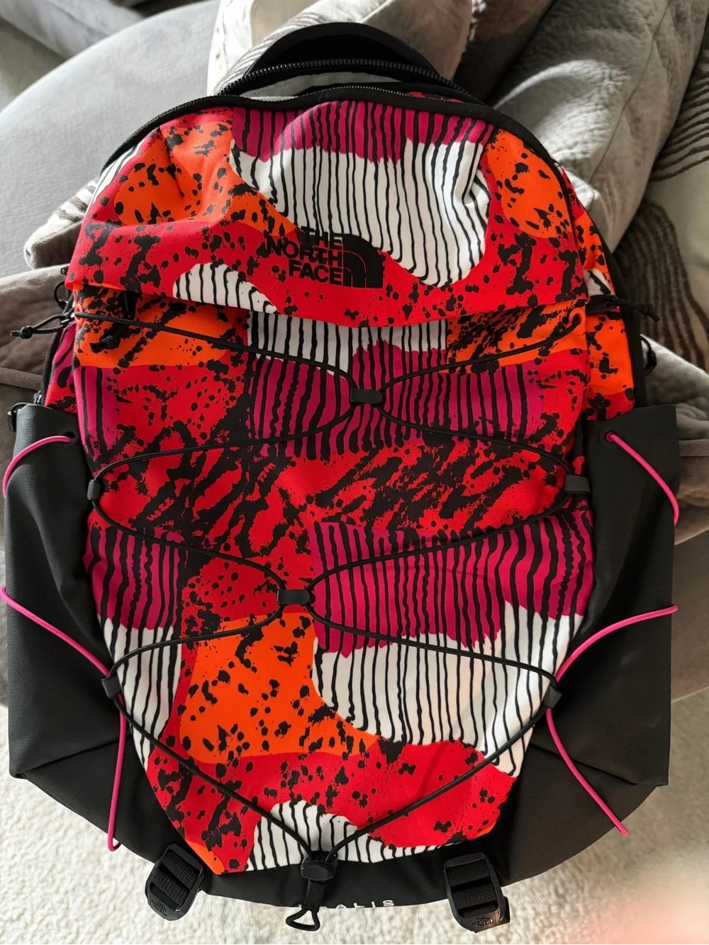 The North Face Red, Orange & Pink Graphic backpack
